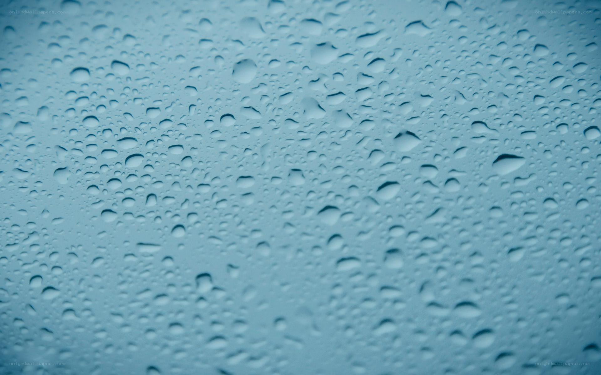 raindrops on a blue surface
