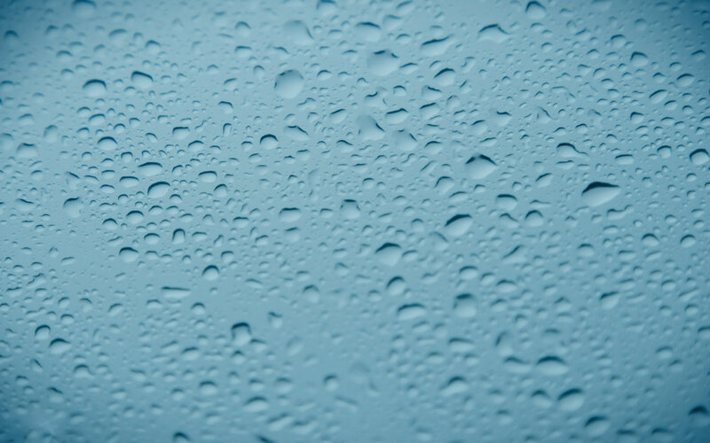 raindrops on a blue surface