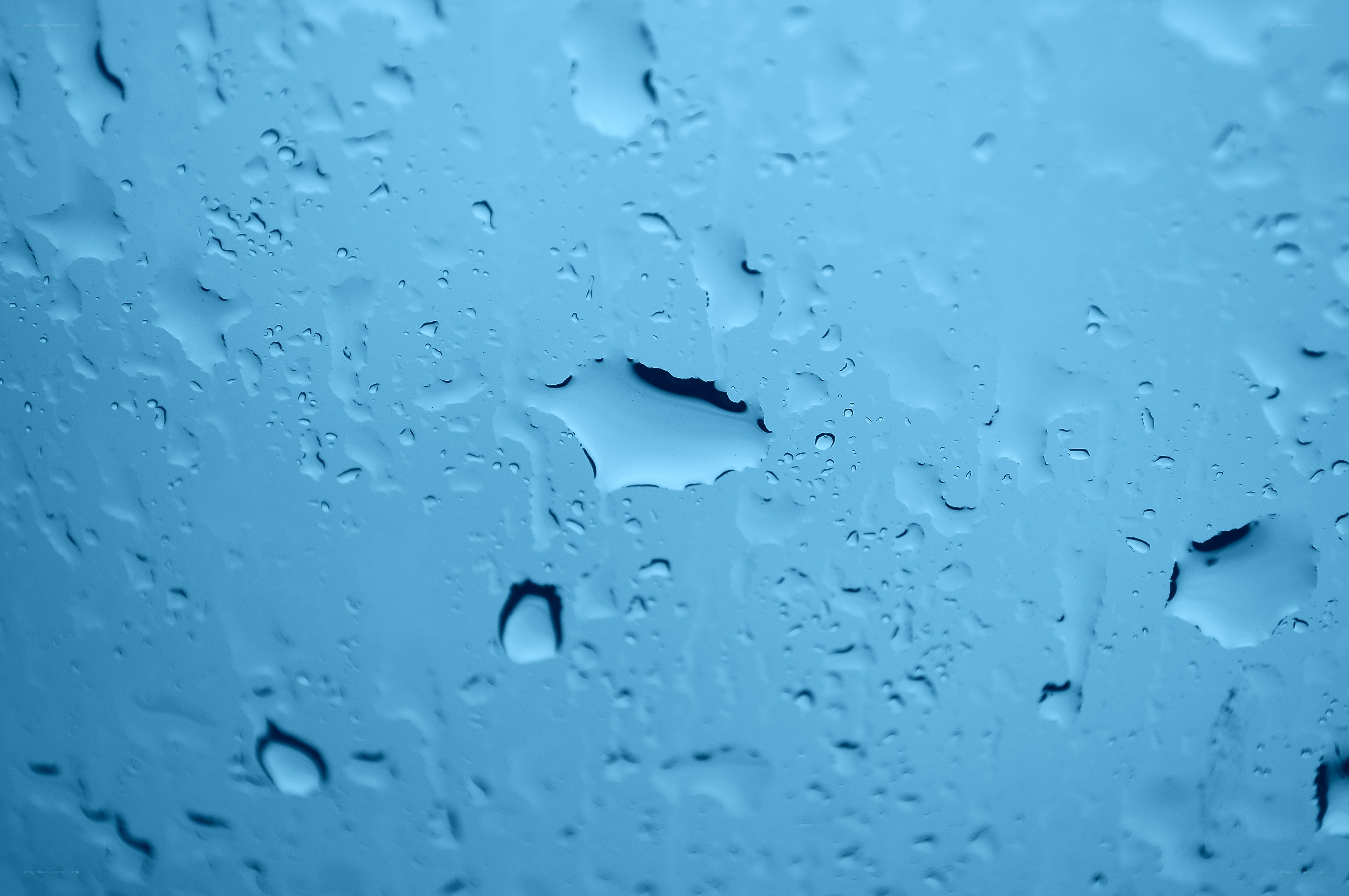 raindrops on a blue surface