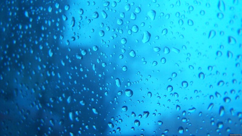 Raindrops on a blue surface