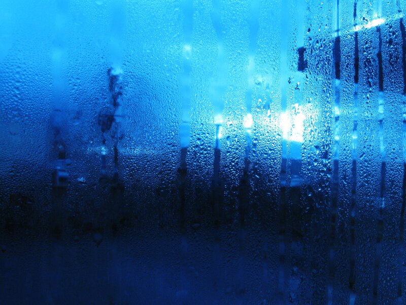 Raindrops on a blue window