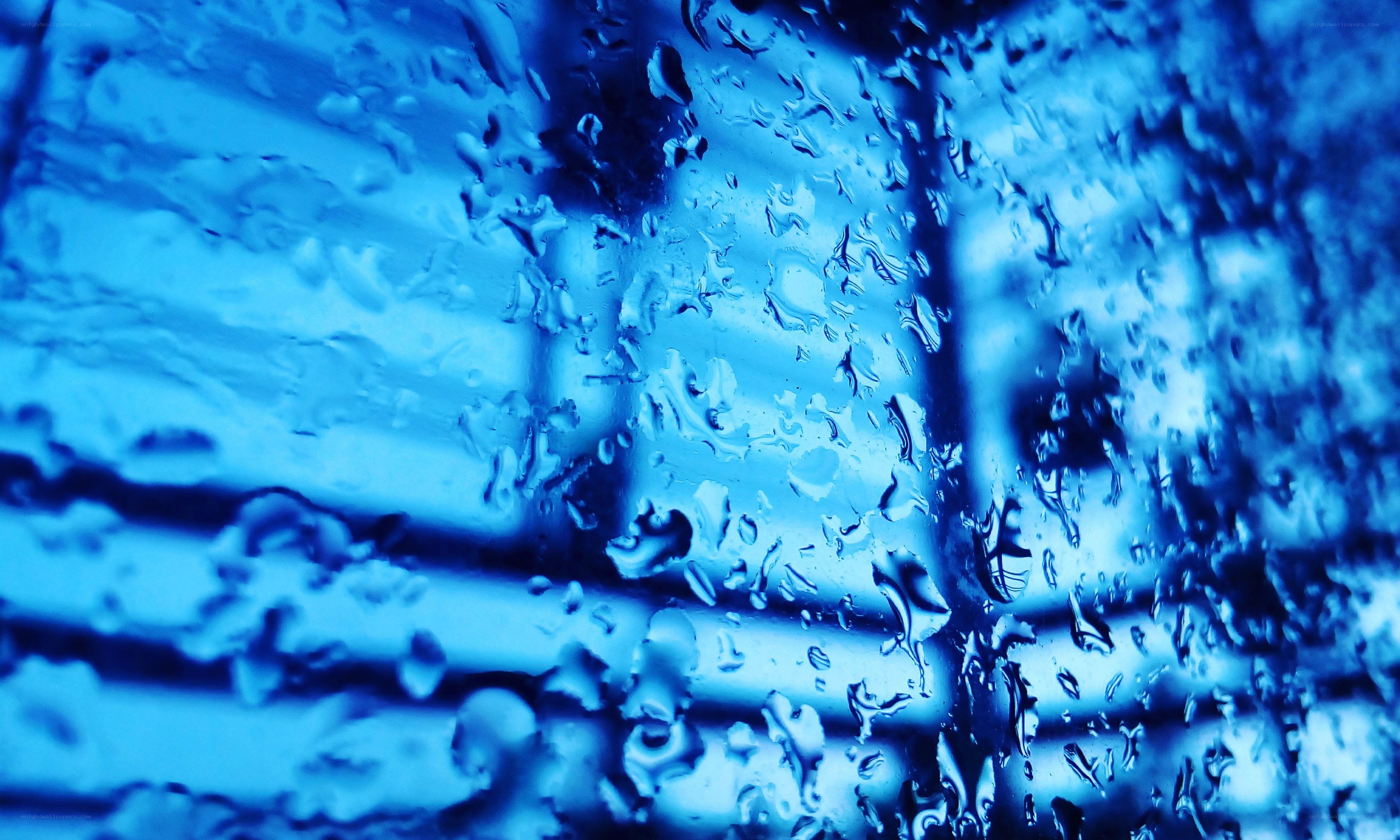 raindrops on a blue window