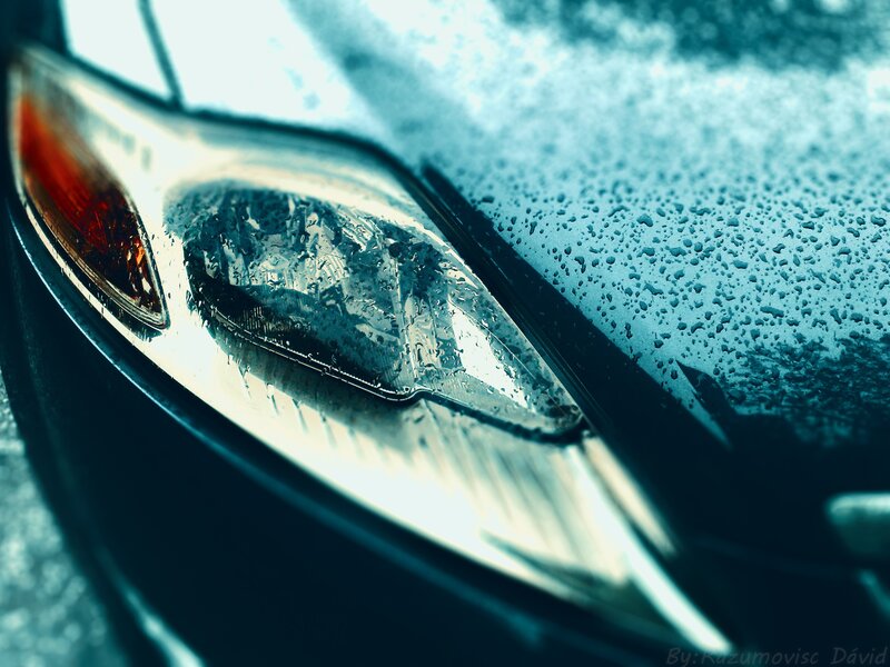 raindrops on a car headlight