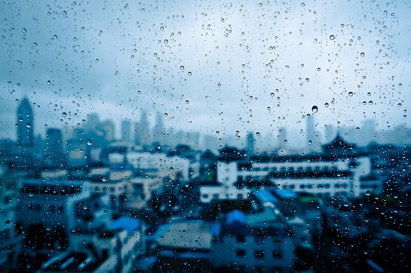 Raindrops on a city window