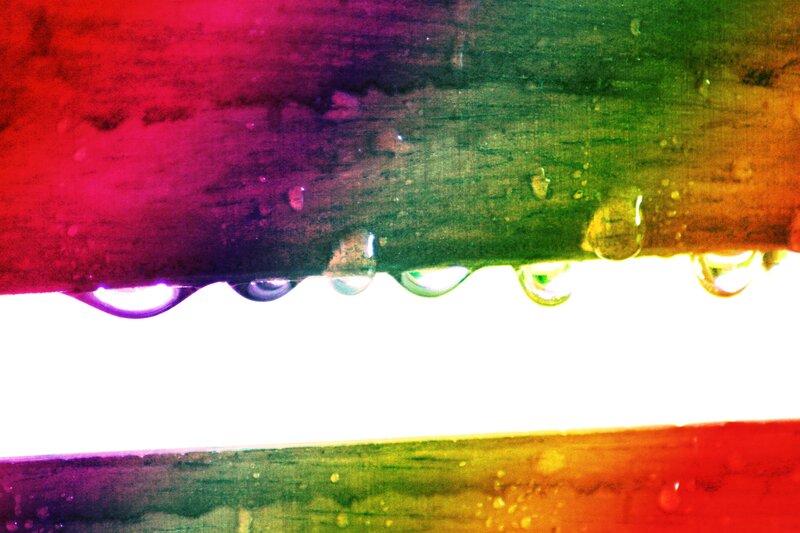 raindrops on a colorful surface