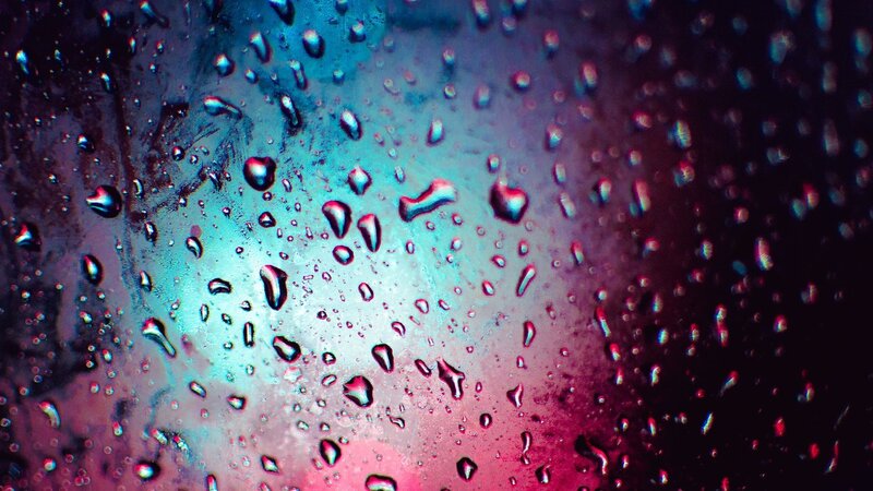 raindrops on a colorful surface