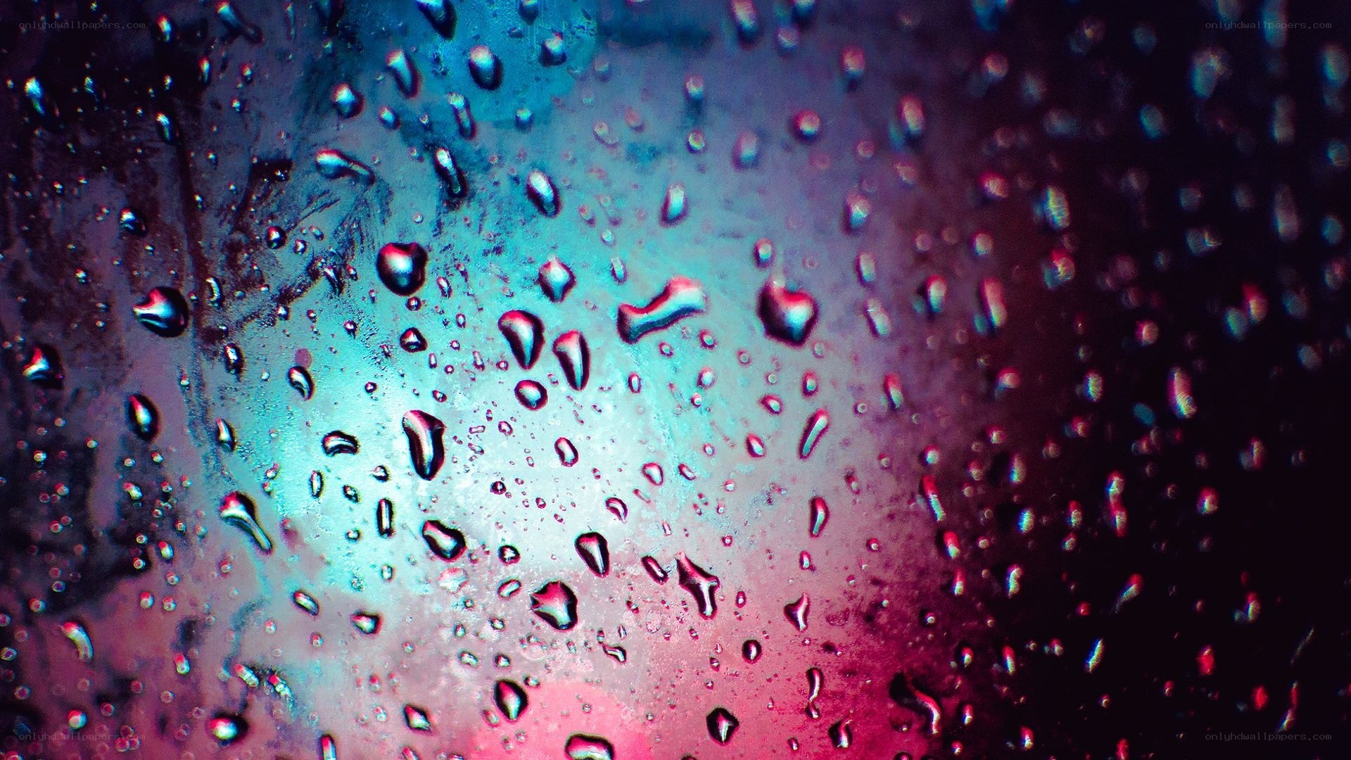 raindrops on a colorful surface
