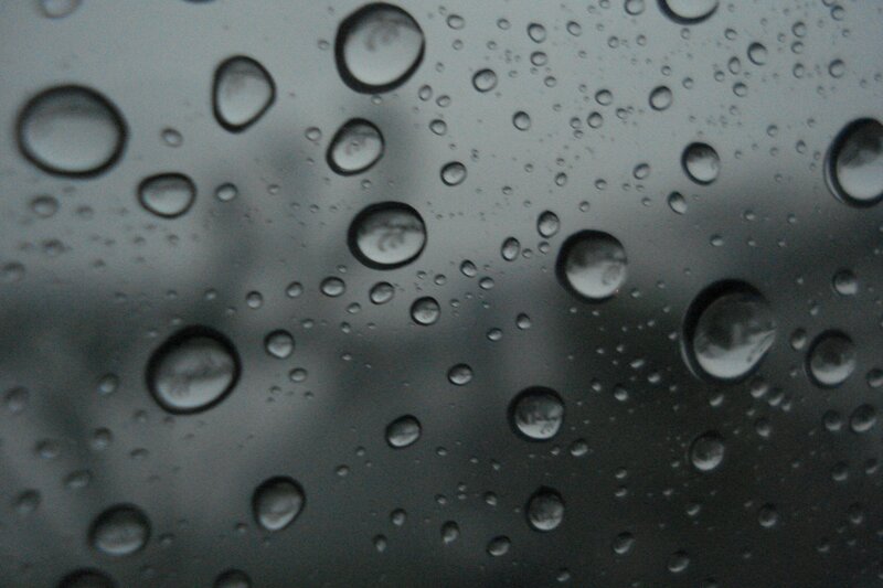 raindrops on a dark surface