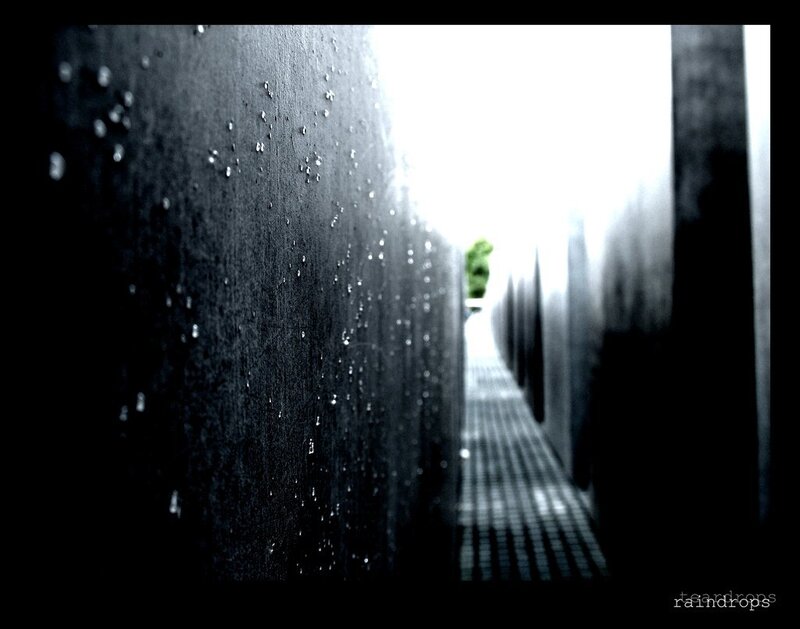 raindrops on a dark wall