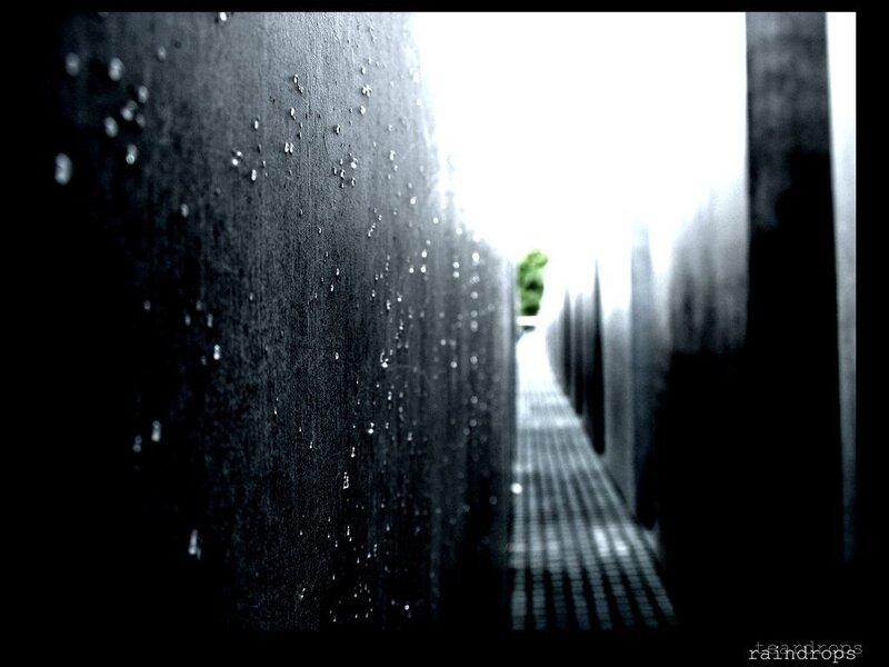 raindrops on a dark wall