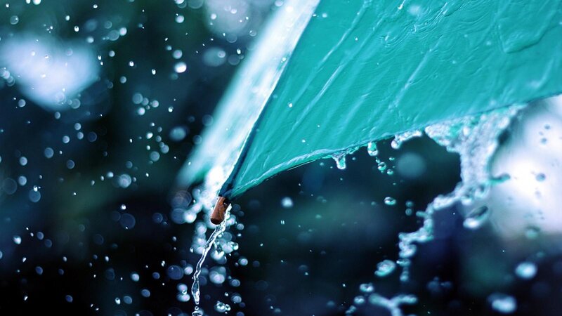 raindrops on a green umbrella