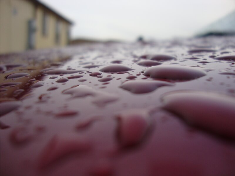 raindrops on a red surface
