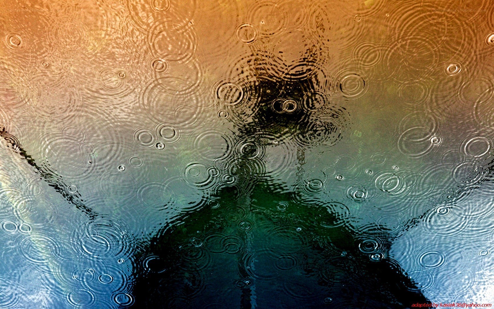 Raindrops on a reflective surface