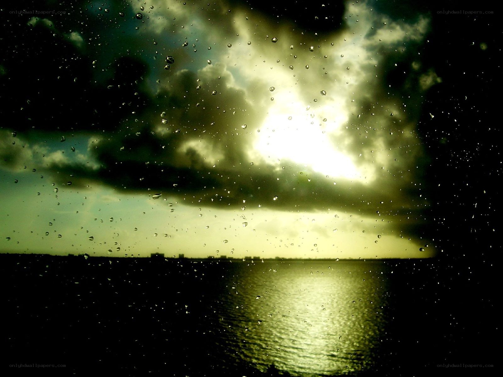 Raindrops on a stormy sunset view