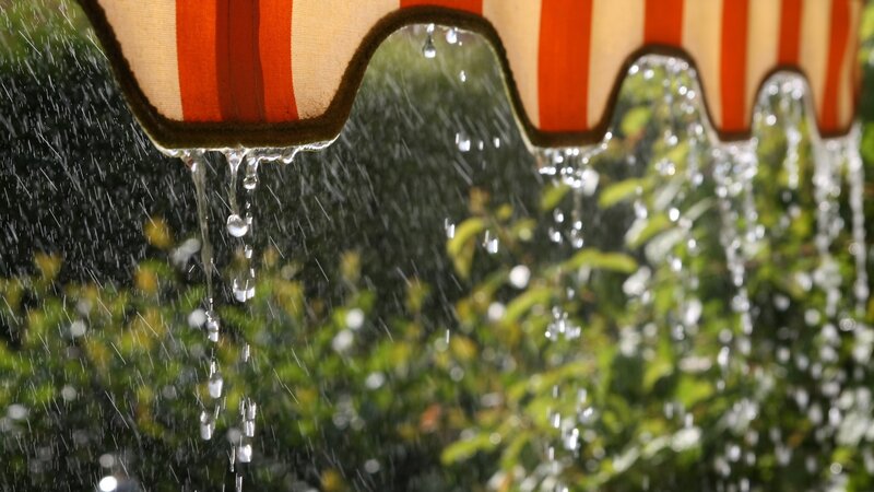 raindrops on a striped canopy