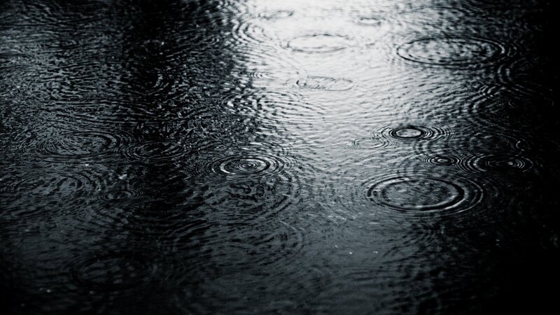 raindrops on a wet surface