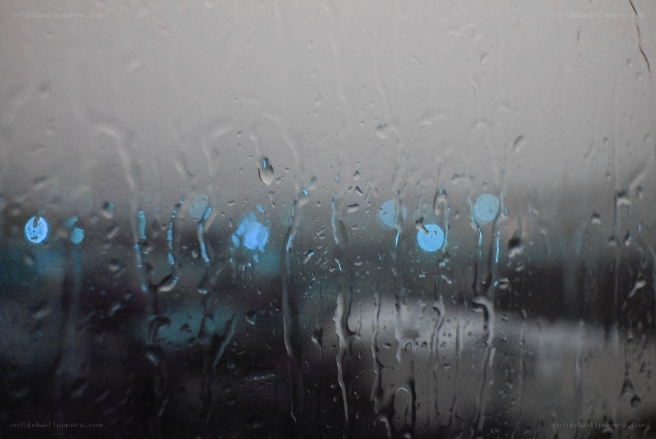raindrops on a window at night