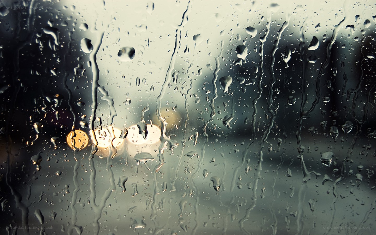 raindrops on a window at night