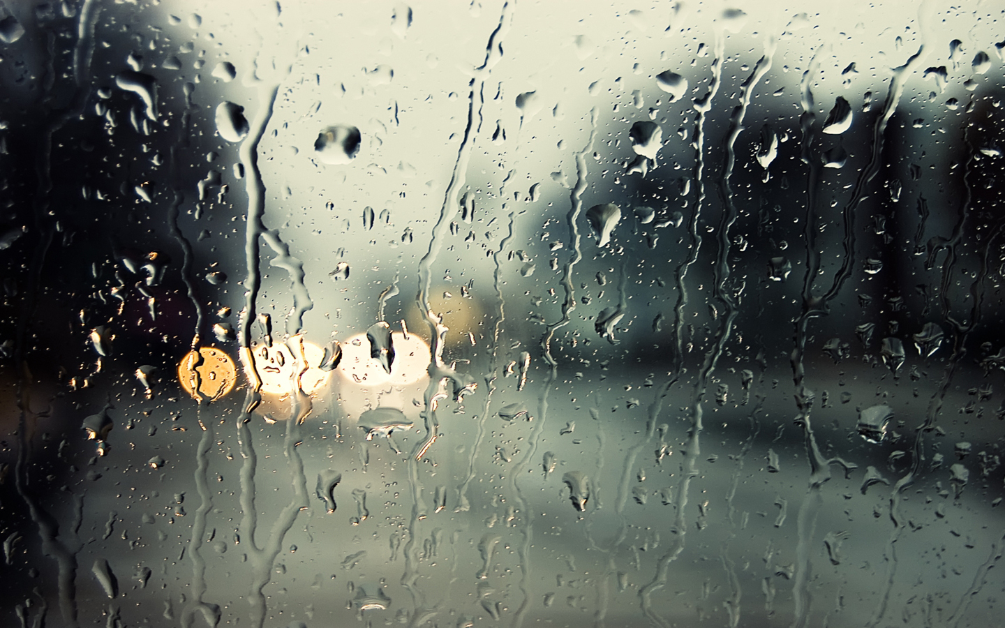 raindrops on a window at night