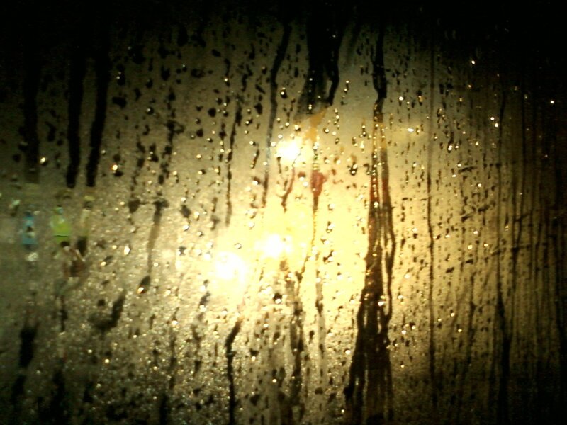 raindrops on a window at night