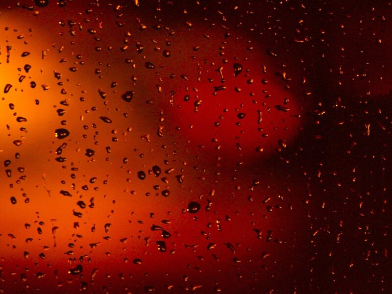 raindrops on a window at night