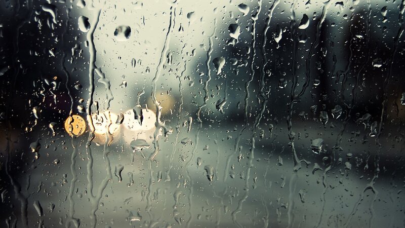 raindrops on a window at night