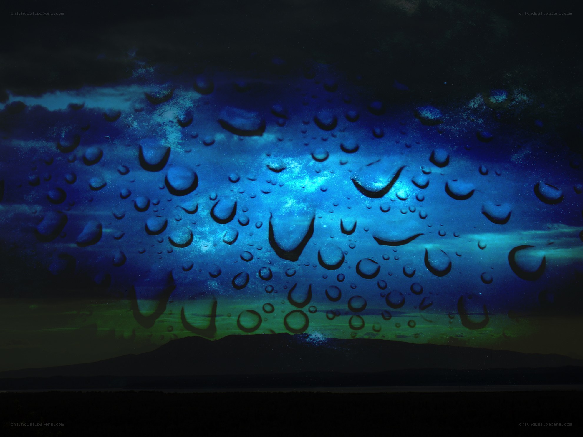 raindrops on a window at night