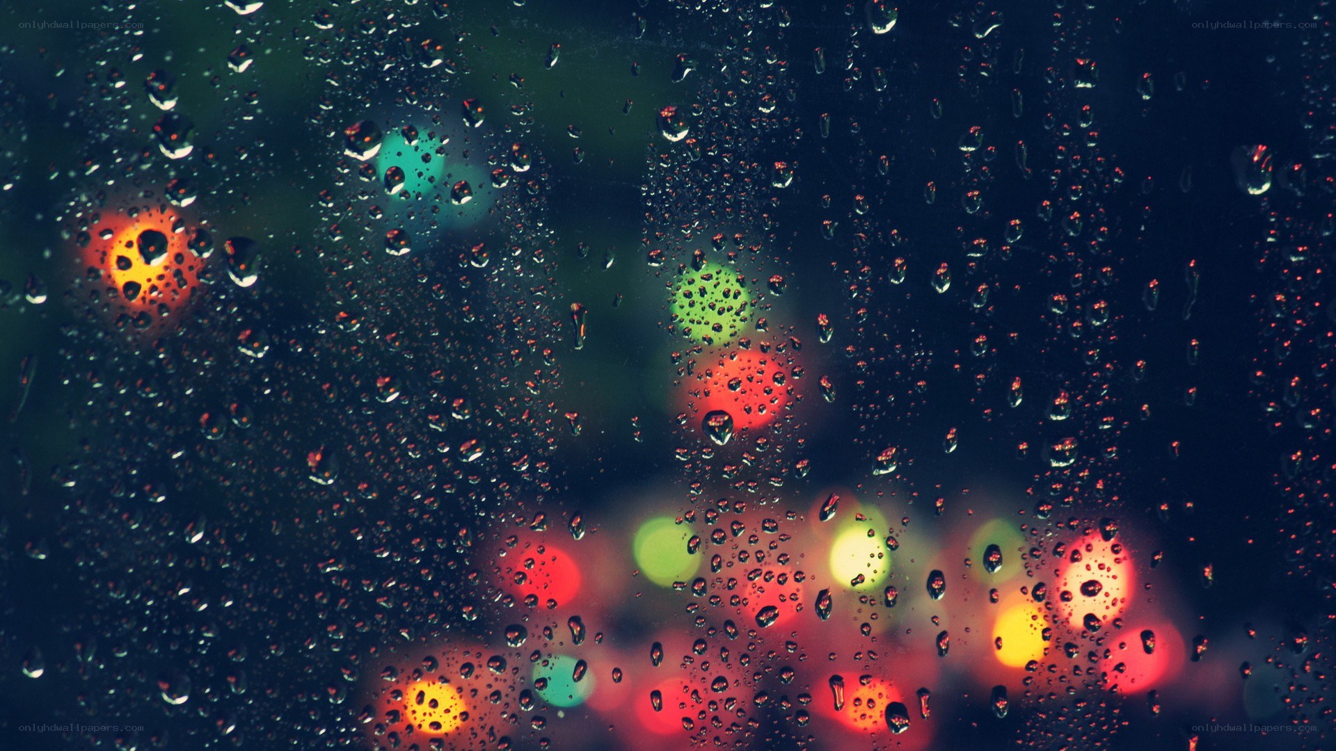 raindrops on a window at night