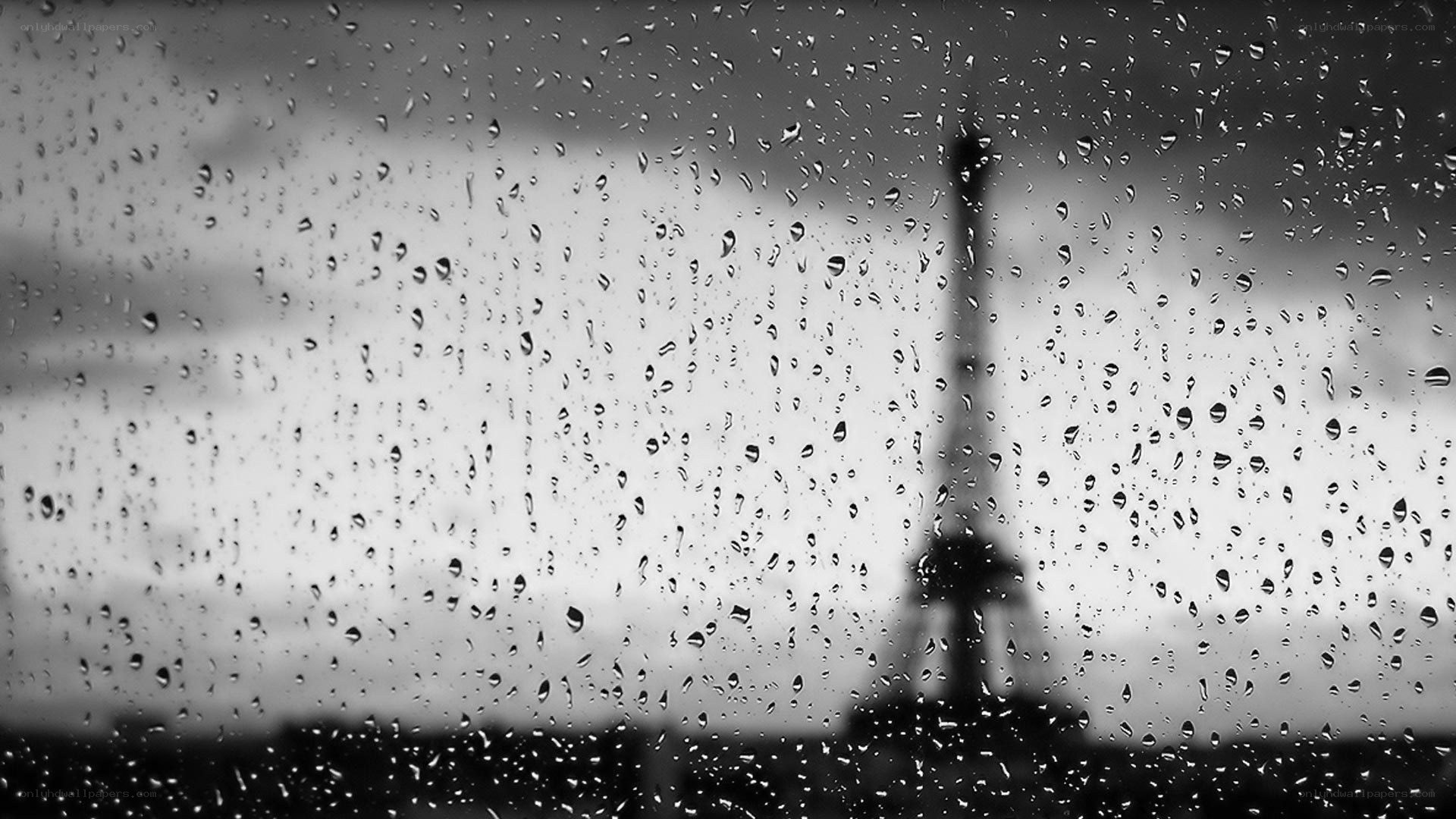 Raindrops on a window with Eiffel Tower