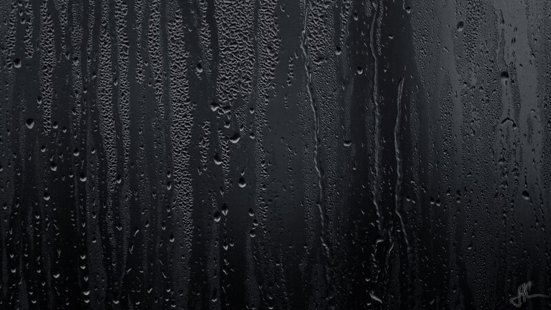 Raindrops on Black Surface