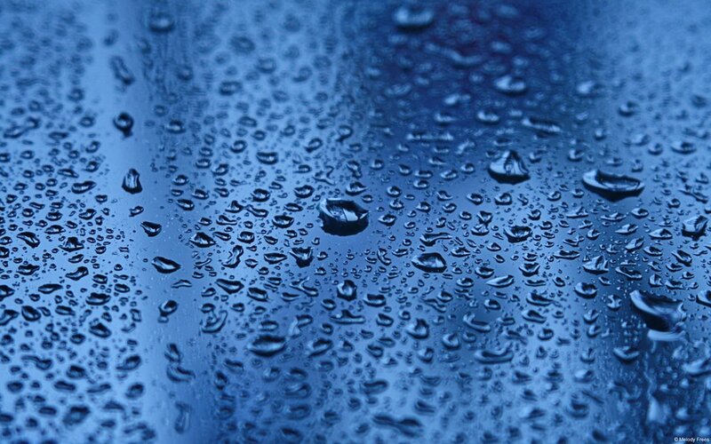 Raindrops on Blue Surface — Calm