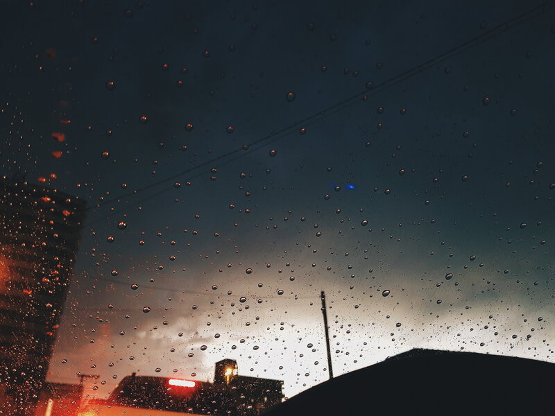 Raindrops on Car Window — Dark Blue