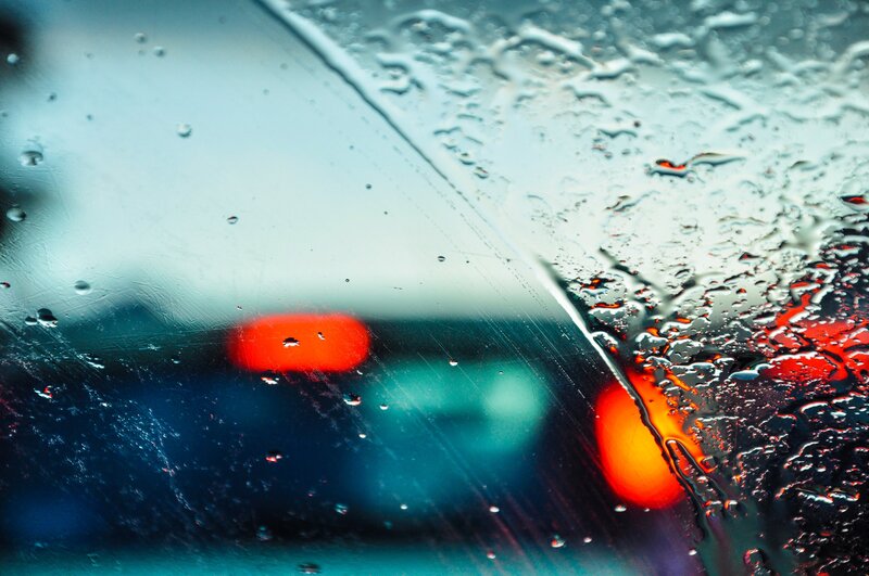 Raindrops on Car Window — Red, Moody