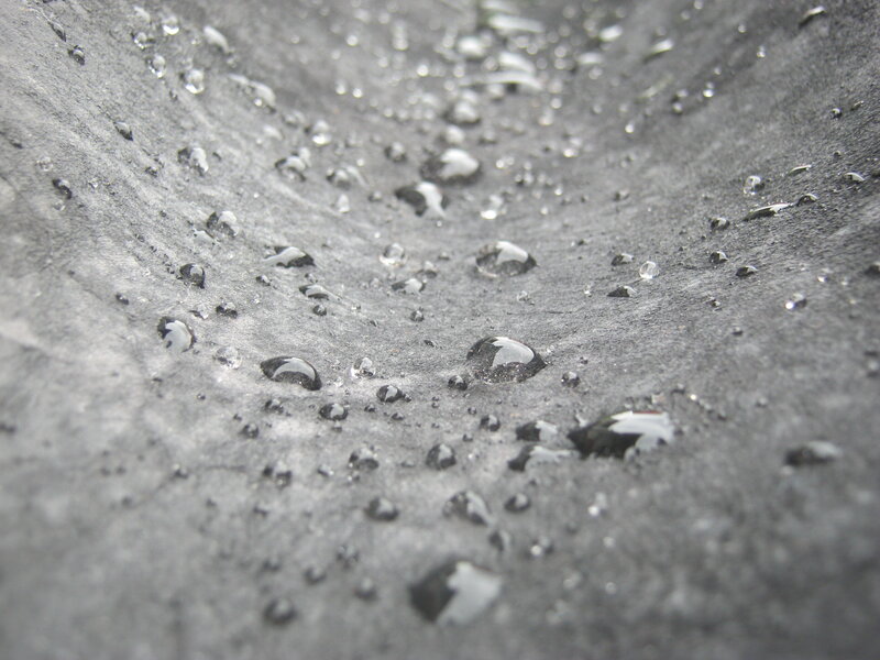Raindrops on Dark Surface — Gray