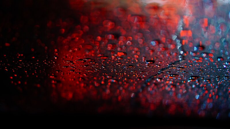 Raindrops on Dark Surface — Red