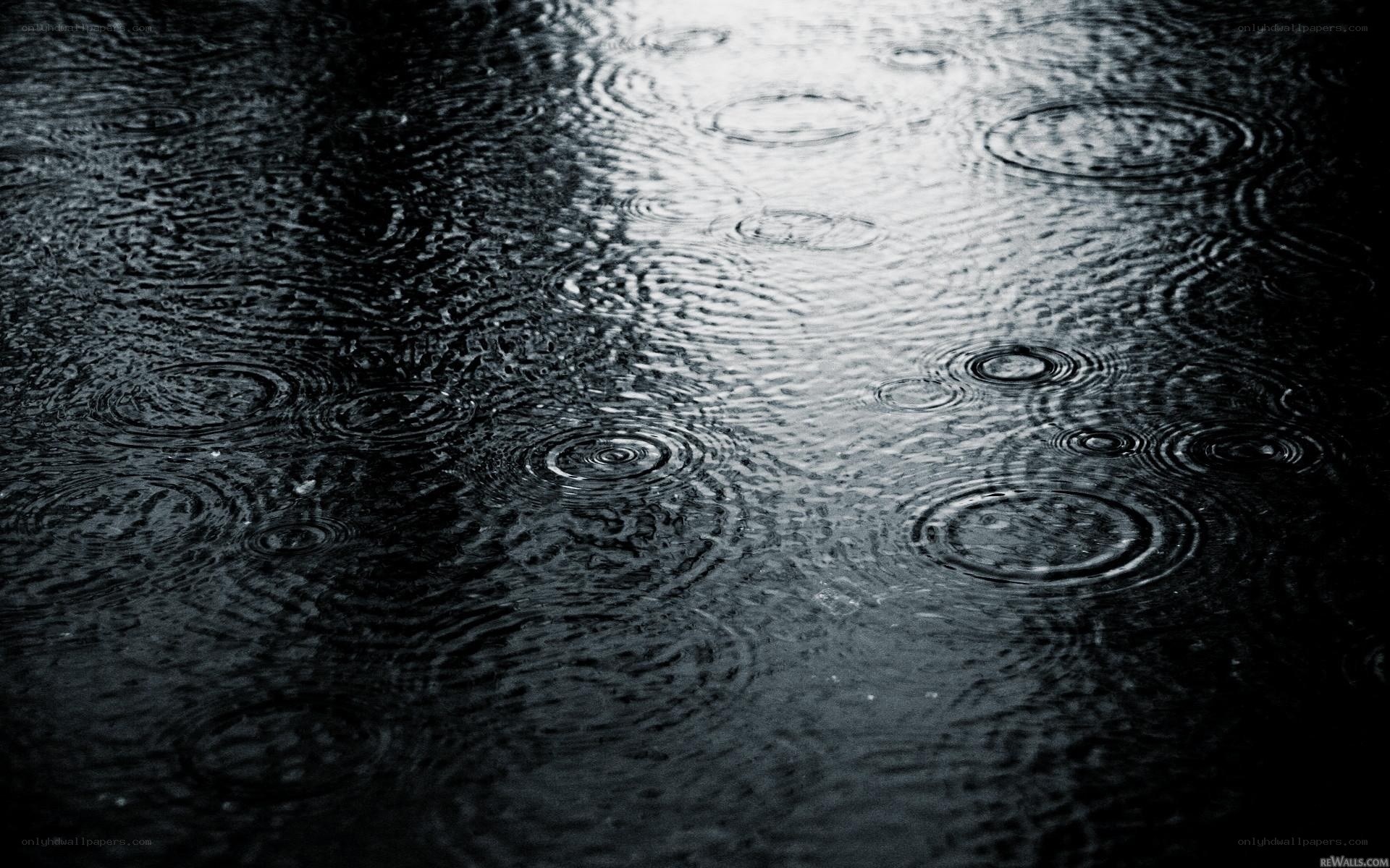 raindrops on dark water