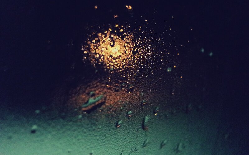 Raindrops on Glass at Night — Black