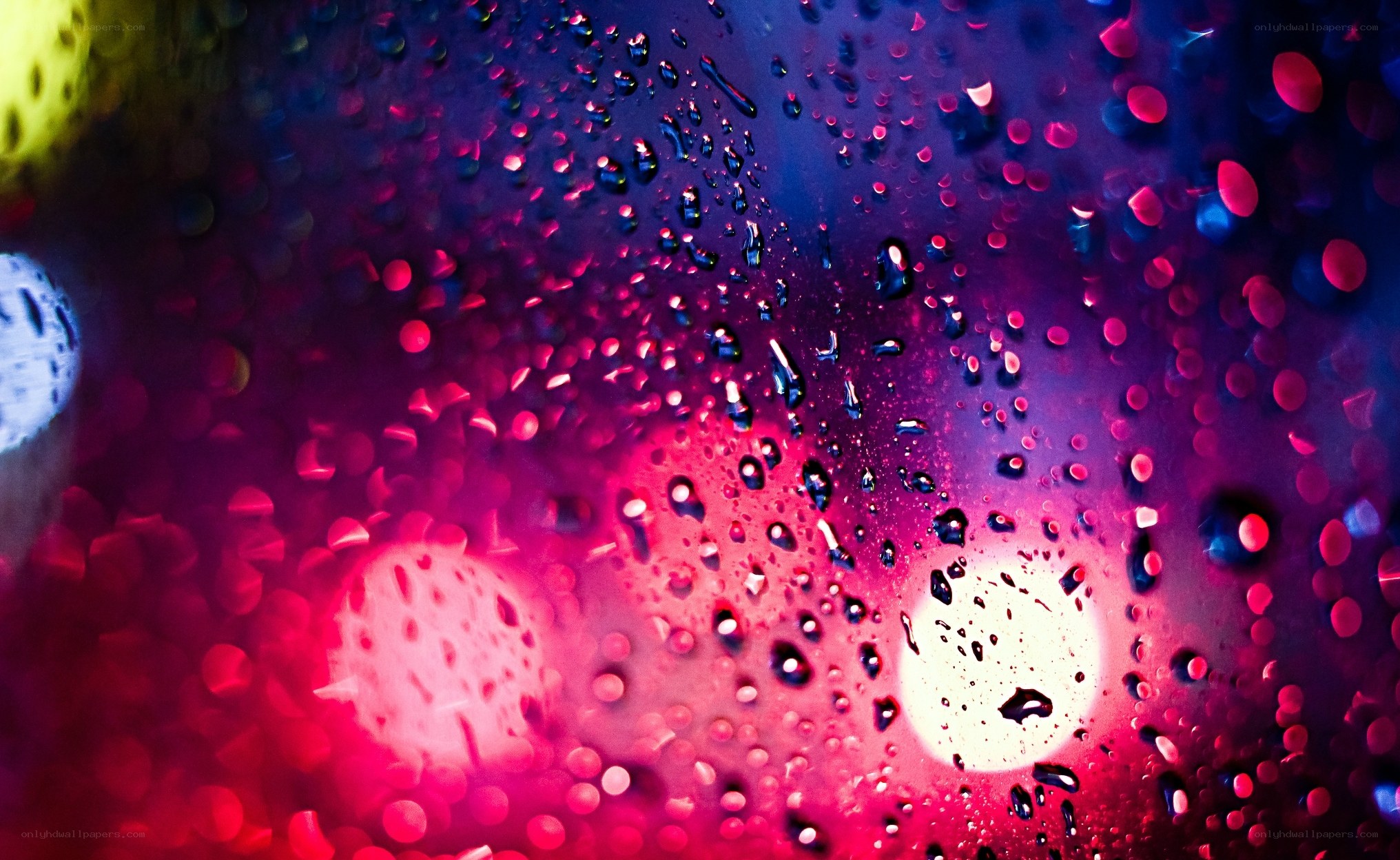 raindrops on glass at night