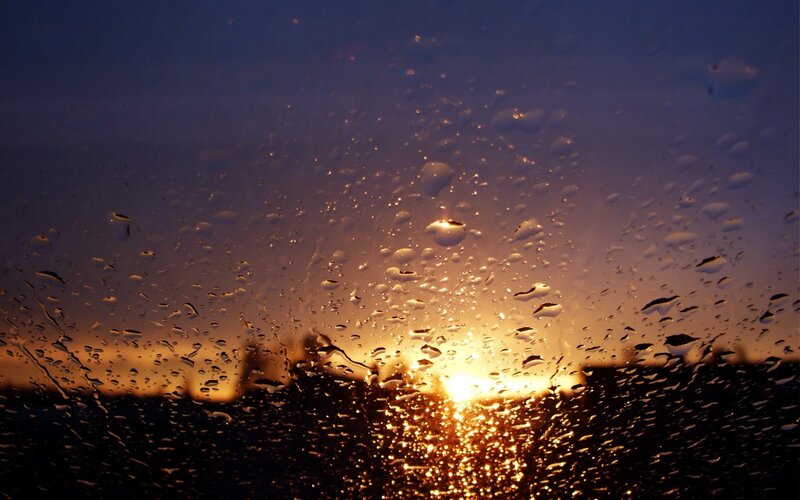 Raindrops on Glass at Sunset — Orange, Dramatic, Photograph