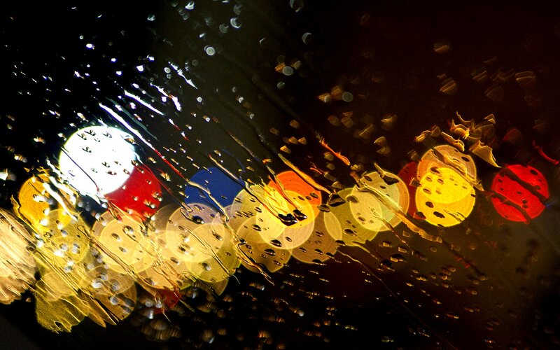 Raindrops on Glass with Lights — Yellow