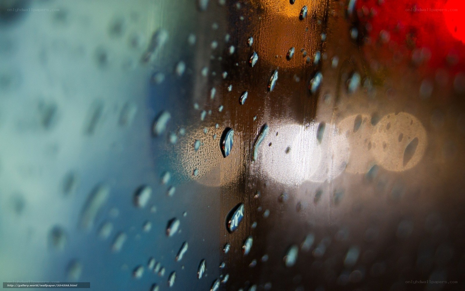 raindrops on glass with lights