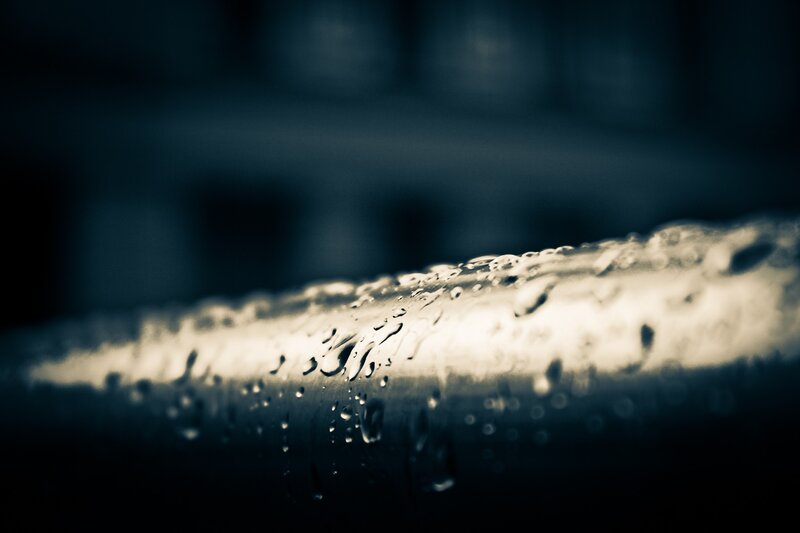Raindrops on Metal Surface — Black