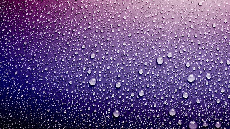 Raindrops on Purple Surface