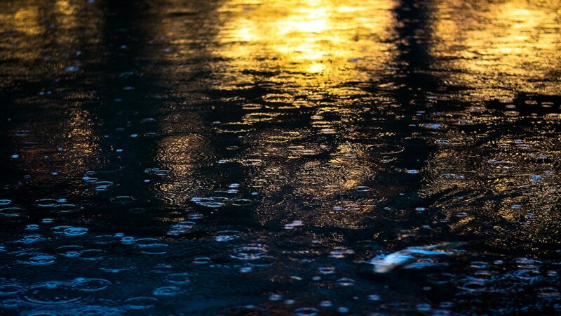 Raindrops on Water Surface — Black, Dramatic
