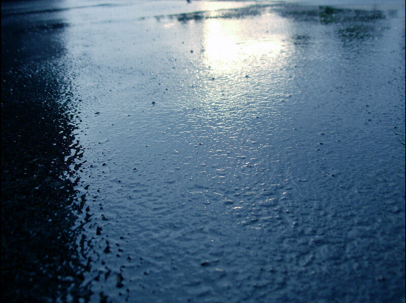 raindrops on wet pavement