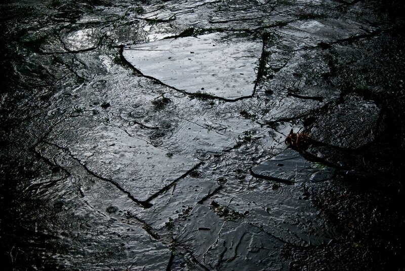 raindrops on wet stone path