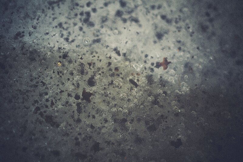 Raindrops on Wet Surface — Gray, Dramatic
