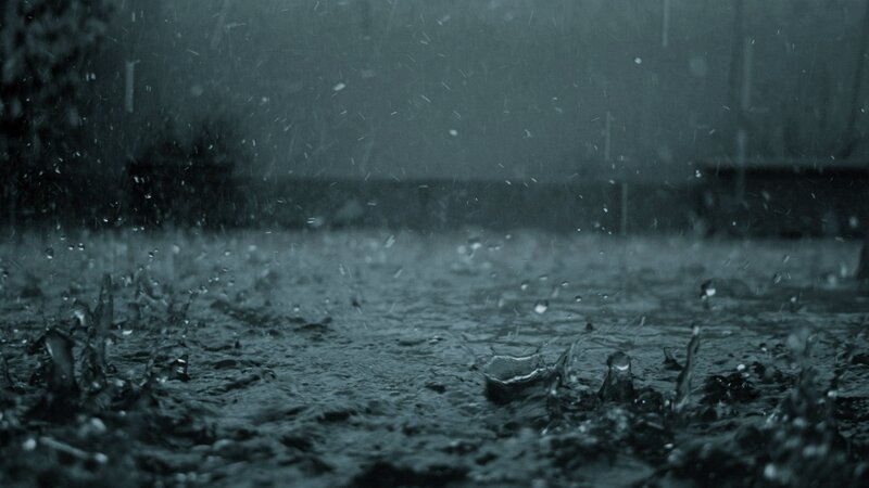 Raindrops on Wet Surface — Gray, Dreary