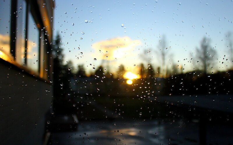 Raindrops on Window — Blue, Calm, Sunset, Photograph, Trees, Building, Yellow