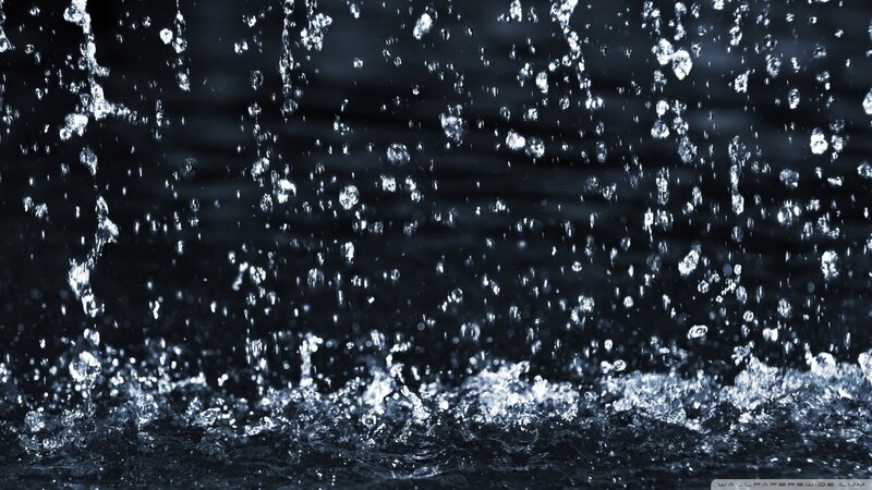Raindrops Splashing on Water